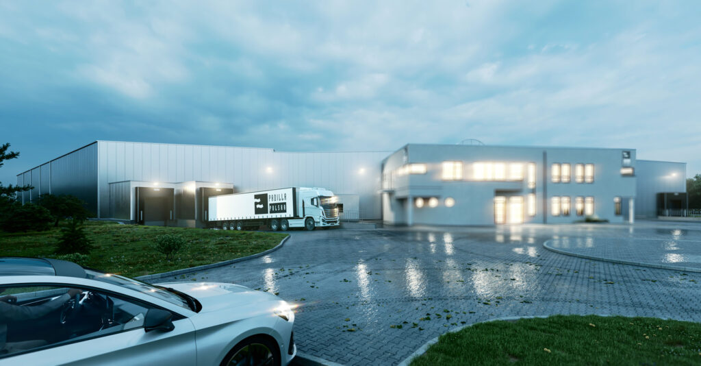 Hala dla producenta drzwi przeciwpożarowych, wizualizacja oświetlonego wejścia i placu manewrowego podczas deszczowej pogody