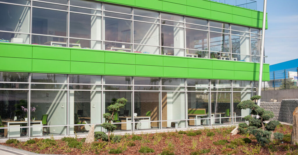 fragment elewacji 1 - hala magazynowa z budynkiem biurowym, dla Sun Garden Poland, Malanów